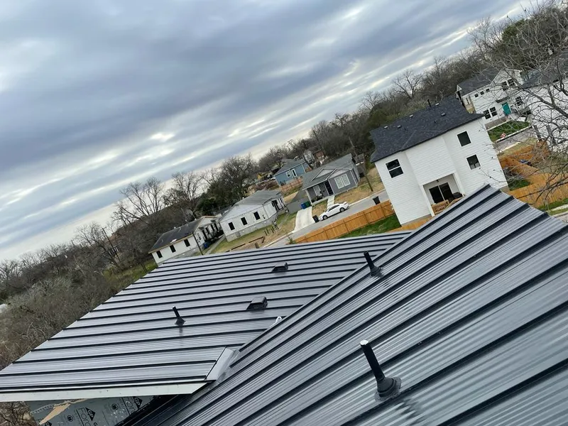 Standing seam metal roof panels with vents for Skylight Repair in St. Andrews